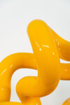 This minimalist metal outdoor sculpture in bright yellow was created by Canadian sculptor Alexander Caldwell. Image 5