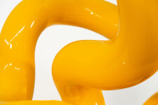 This minimalist metal outdoor sculpture in bright yellow was created by Canadian sculptor Alexander Caldwell. Image 7