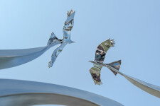 The graceful flight of two birds is captured in this stunningly elegant contemporary sculpture by Amos Robinson. Image 10