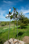 This contemporary outdoor sculpture is forged from stainless steel to resemble clouds. Image 3