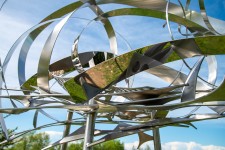 In this elegant sculpture by Ania Biczysko, fine ribbons of stainless-steel overlap in circles forming a cloud-like structure mounted on a t… Image 7