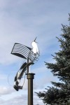 Shiny strips of stainless steel change colour and reflect light in this stunning outdoor sculpture by Ania Biczysko. Image 3