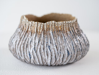 This contemporary ceramic vessel in cobalt blue was created by Bill Greaves.