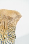 This contemporary ceramic vessel’s shape was inspired by nature. Image 7