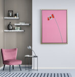 A Canadian flag flies smartly from the top of a grey-green pole that swoops into the centre of a flat, taffy pink sky. Image 7