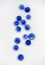 This contemporary glass wall sculpture in a stunning lapis blue colour was created by an award-winning artist.