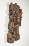 This contemporary wall sculpture is made of fired glass; its design is inspired by nature and rock formations. Image 2