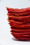 In a stunning warm red, this table top glass sculpture was created by Cheryl Wilson-Smith. Image 5