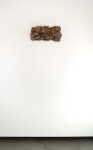 This contemporary wall sculpture is made of fired glass; its design is inspired by nature and rock formations. Image 4