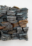 This contemporary wall sculpture is made of fired glass; its design is inspired by nature and rock formations. Image 6