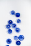 This contemporary glass wall sculpture in a stunning lapis blue colour was created by an award-winning artist. Image 6