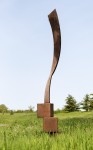 An elegantly curved column of corten steel appears to almost float in mid-air in this arresting outdoor sculpture by Claude Millette. Image 3