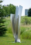 The graceful arc of a dancer in motion is emulated in the fluid form of this elegant sculpture by Claude Millette. Image 3