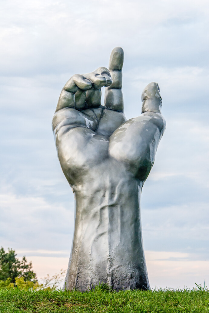 Created by Canadian artist David Sheridan, this outdoor fibreglass sculpture is a unique combination of pop and classical figurative styles.