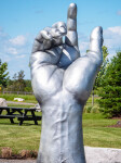 Created by Canadian artist David Sheridan, this outdoor fibreglass sculpture is a unique combination of pop and classical figurative styles. Image 8