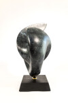 This contemporary bronze sculpture inspired by music is shaped like a heart and was made by David Chamberlain. Image 5