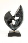 This contemporary bronze sculpture inspired by music is shaped like a heart and was made by David Chamberlain. Image 7