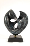 This contemporary bronze sculpture inspired by music is shaped like a heart and was made by David Chamberlain. Image 4