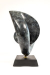 This contemporary bronze sculpture inspired by music is shaped like a heart and was made by David Chamberlain. Image 3