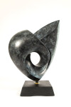 This contemporary bronze sculpture inspired by music is shaped like a heart and was made by David Chamberlain. Image 6