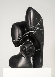 This contemporary sculpture was inspired by nature and is made from black marble.