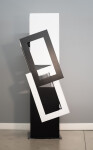 This abstract sculpture, which can also be installed outside, is painted in a striking black and white. Image 5