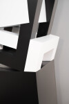 This abstract sculpture, which can also be installed outside, is painted in a striking black and white. Image 10