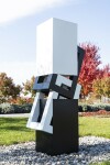 This abstract sculpture, which can also be installed outside, is painted in a striking black and white. Image 14