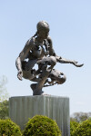 This figurative bronze and stainless steel outdoor sculpture of a female was created by a Canadian artist. Image 7