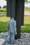 This contemporary outdoor sculpture was forged from steel in a figurative and geometric form. Image 7