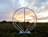 Canadian artist Jake Goertzen creates a symmetrical design with six stainless steel rings in this elegant outdoor sculpture. Image 11