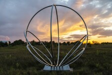 Canadian artist Jake Goertzen creates a symmetrical design with six stainless steel rings in this elegant outdoor sculpture. Image 10