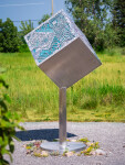 A stainless-steel cube is laser cut on three sides with the outline of a digital circuit board in this intriguing outdoor sculpture by Jake … Image 9