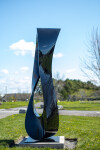 This large outdoor abstract sculpture by Jeremy Guy is hand-forged from stainless steel and finished in a glossy black. Image 2