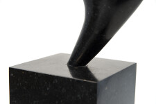 The graceful form of a female figure emerges from hand-chiselled black granite in this classically elegant sculpture by Jeremy Guy. Image 6