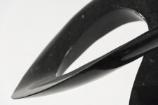 Smooth-surfaced, engineered black granite is sculpted into an elegant, spinning form by Jeremy Guy. Image 2