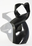 Sculptor Jeremy Guy’s lyrical and moving abstract representation of a human embrace is created from engineered black granite. Image 9