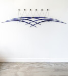 Canadian artist John Paul Robinson has chosen a deep blue for this elegant glass wall sculpture. Image 11