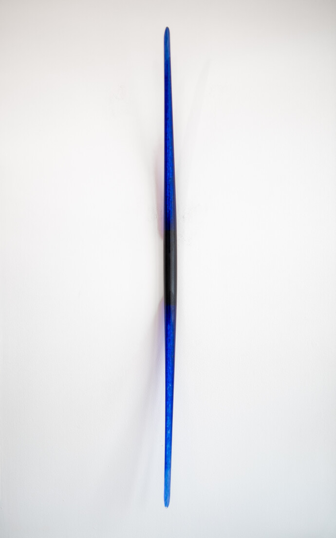 This contemporary glass wall sculpture in deep blue is by John Paul Robinson.