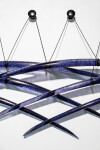 Canadian artist John Paul Robinson has chosen a deep blue for this elegant glass wall sculpture. Image 4