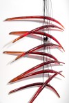 Elegantly curved deep red glass pieces in twos are suspended on fine black steel cables in this dramatic new wall sculpture by Canadian arti… Image 3