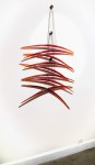 Elegantly curved deep red glass pieces in twos are suspended on fine black steel cables in this dramatic new wall sculpture by Canadian arti… Image 8