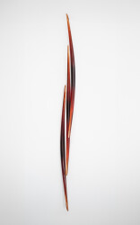 This modern glass wall sculpture in red was forged by John Paul Robinson.