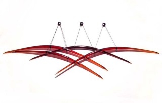 Canadian artist John Paul Robinson has chosen deep red, the colour of fire for this stunning glass wall sculpture.