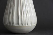 This contemporary white ceramic vessel is handmade. Image 4