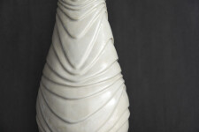 This contemporary white ceramic vessel is handmade. Image 4