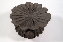 This contemporary ceramic vessel was inspired by nature and rendered in black. Image 3