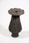 This contemporary ceramic vessel was inspired by nature and rendered in black. Image 2