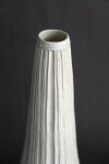 This contemporary white ceramic vessel is handmade. Image 2