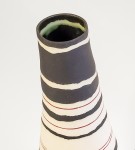 At once elegant and striking in their design, these porcelain vessels were created by Loren Kaplan. Image 5